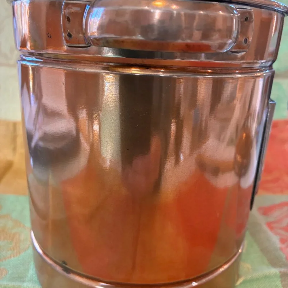 Treat bin with copper finish and photo slot